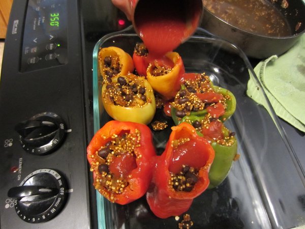 The stuffed peppers are ready to go into the oven.