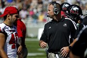 Northern Illinois coach Dave Doeren walks the sideline in the first half of NIU’s game against Army on Saturday in West Point, N.Y. After facing Army’s run-heavy offense, the Huskies are preparing to face a more balanced attack from Kansas University on Saturday.