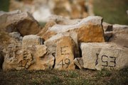 Stones for the east wall of the jail are piled together and numbered to ease the process of reconstructing the building as closely as possible to its original form when it was built in 1892.