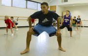 Instructor Matt Rodriguez, Lawrence, goes through a dance routine with his students in his Athletic Movement for Boys and Young Men class Friday, Sept. 14, 2012, at the Lawrence Arts Center, 940 N.H.