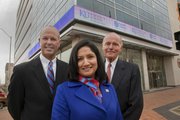 Richard Gwin/Journal World-Photo.Capitol Federal announced at a partnership with KU, as from left, Capitol Federal Chairman & CEO John Dicus, KU business School Dean Neeli Bendapudi, and Capitol Federal Chairman Emeritus Jack Dicus stand in front of Capitol Federals Headquarters in Topeka as a banner sign shows off the partnership between the two as the Capitol Federal Foundation announced a $20 million dollar donation to KU's School of business toward a new building expected to cost $60 million or more.