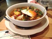 Sopa Port Fonda at Port Fonda, 4141 Pennsylvania Ave., Kansas City, Mo. The spicy soup features pork belly, shredded pork shoulder, bacon-chile broth, fresh vegetables and a fried egg.