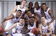 The Kansas freshmen class from top row left are: Zach Peters, Perry Ellis, Jamari Traylor and Ben McLemore. Middle Row: Andrew White, left, and Landen Lucas. Front row sitting: Tyler Self, Rio Adams and Evan Manning.