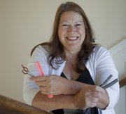 Vicki Rajewski, Topeka, is a barbering instructor to inmates at the United States Disciplinary Barracks at Fort Leavenworth.