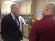 Sen. Jerry Moran speaks with LMH pharmacist Greg Burger about the hospital pharmacy's use of electronic medical records in the administration of medicine.