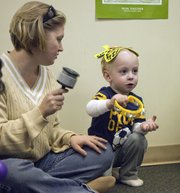 Darcey Erickson and her son, Jackson, 2, play music together in a Meadowlark Music Together parent-tot class at First Baptist Church, 1300 Kasold Drive.