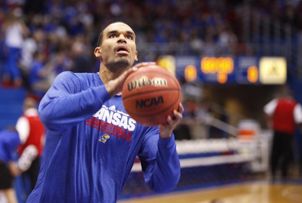 Kansas freshman Perry Ellis heads up to the bucket during warmups before tipoff of an exhibition against Emporia State, Tuesday, Oct. 30, 2012 at Allen Fieldhouse.