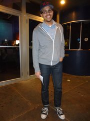 DJ Johnson, Olathe. Clothing details: hat, Baldwin Denim, two months ago, $40; hoodie, thrifted, American Apparel, a year ago, $6; shirt, thrifted, a year ago, $5; jeans, Urban Outfitters, six months ago, $50; shoes, Converse Chuck Taylor, a year and a half ago, $40.