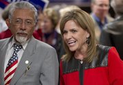 Rep. Lynn Jenkins, R-Kan., watches results with Kansas house candidate Shanti Gandhi , left, at the Republican election watch party in Topeka, Kan., Tuesday, Nov. 6, 2012.