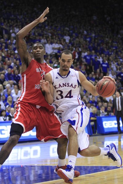 KU forward Perry Ellis (34) drives against Southeast Missouri State's Tyler Stone on Friday at Allen Fieldhouse.