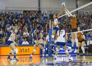 Kansas' Tayler Tolefree (5) and Texas' Molly McCage battle it out at the net during Kansas' volleyball match against Texas, Saturday, Nov. 10, 2012 at the Horejsi Center.