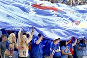 Kansas University students and fans unveil a large KU banner and cheer on the Jayhawks before the start of the football game against TCU on Sept. 15 at Memorial Stadium. KU has no plans to begin selling alcohol at its games, unlike new Big 12 addition West Virginia University.