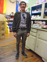 Jason Koontz, Lawrence. Clothing details: Cardigan, thrifted, 5 years ago, $13; shirt, thrifted in California, March, $3; pants, Buffalo Exchange, May, $11; shoes, Ross, Converse All-Star, August, $20.