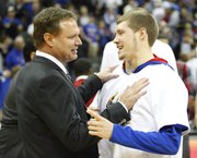 Kansas head coach Bill Self jokes with his son Tyler after the win over Saint Louis in the CBE Classic, Tuesday, Nov. 20, 2012 at the Sprint Center in Kansas City, Missouri.