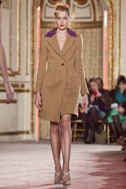 Look for a well-fitted winter coat, like this one from the Thakoon Fall 2012 collection, modeled during Fashion Week in New York on Feb. 12, 2012.