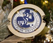 This year’s Kansas state ornament bears the 150th anniversary logo of Washburn University, depicting the school’s mascot, the Ichabod. The back of the ornament bears the state seal. The ornament was unveiled at Cedar Crest in Topeka Nov. 26, 2012.