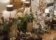 From retro to regal, Lawrence stores are putting out a variety of Christmas decorating styles this season. A first floor display inside M Street Interiors, 835 Massachusetts St., is decked out for the holidays.