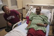 Earlier this week, Rob Robinson, left, donated one of his kidneys to Gillan Alexander at Kansas University Hospital. Both men became friends five years ago after Robinson, of Starkville, Miss., started hunting turkeys on Alexander's farm near Nicodemus, Kan.