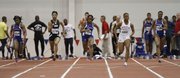 Kansas sprinter Paris Daniels, center, takes off to a first place finish in the fourth heat of the Women's 60 Meter Dash event during the Bob Timmons Challenge on Thursday, Dec. 6, 2012 in Anschutz Pavillion at Kansas University. Also pictured from left are Tianna Valentine, Kansas, Cornesha Wilkerson, Oral Roberts, Latoya King, Lincoln and Francine Simpson, Kansas.