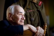 World War II veteran, Jarek Piekalkiewicz fought with the Polish resistance during the Warsaw Uprising of 1944 and was held as a prisoner of war in Germany until liberated by U.S. forces on April 1, 1945. Piekalkiewicz, who is pictured on Wednesday, Dec. 12, 2012, is a subject of a new book, Needle in the Bone, by Lawrence author, Caryn Miriam Goldberg. The book explores stories of survival and a friendship between Piekalkiewicz and Holocaust survivor Lou Frydman. Nick Krug/Journal-World Photo