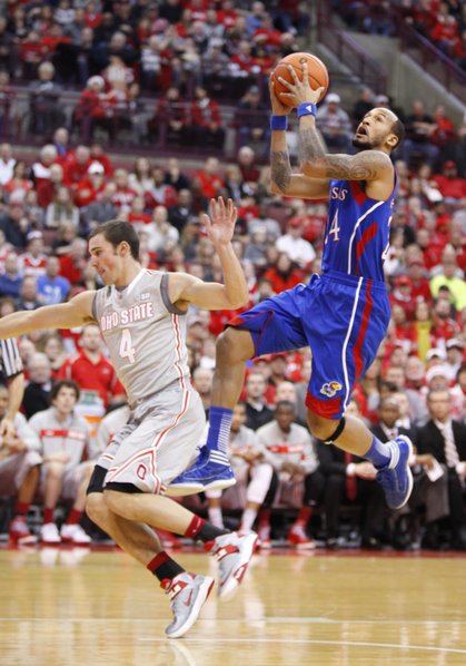 Kansas guard Travis Releford pulls up for a bucket against Ohio State guard Aaron Craft during the first half on Saturday, Dec. 22, 2012 at Schottenstein Center in Columbus, Ohio.