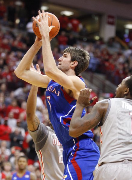 Kansas center Jeff Withey turns for a shot against Ohio State during the first half on Saturday, Dec. 22, 2012 at Schottenstein Center in Columbus, Ohio.