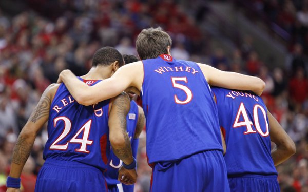 The Jayhawks huddle up during a break in action against Ohio State during the first half on Saturday, Dec. 22, 2012 at Schottenstein Center in Columbus, Ohio.