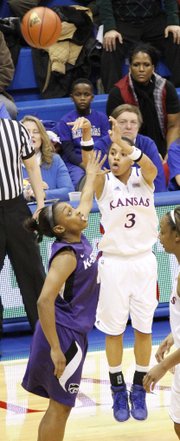 Angel Goodrich (3) launches a three-point shot in the Jayhawks 72-63 win over the Kansas State in Allen Fieldhouse, Wednesday, January 2, 2013.