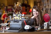 Sharmaine Saldana, owner of U.R.U Decor, 1113 Massachusetts St., is pictured in her store, which specializes in "upcycled, repurposed and upstyled" items, plus antiques.