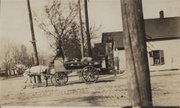 This photo from an unknown location depicts an everyday scene from the early days of Kansas breweries, when kegs of beer were delivered around town — and empties picked up — by horse and wagon.