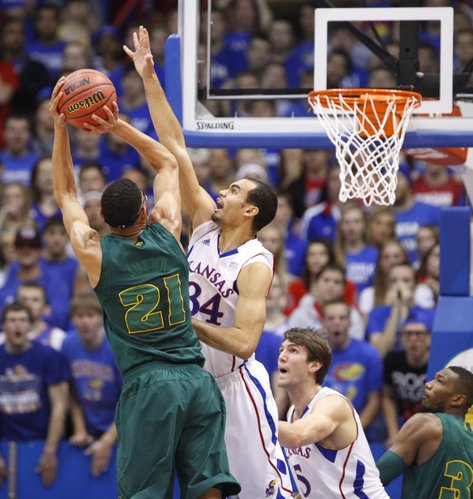 Kansas forward Perry Ellis gets up to block a shot by Baylor center Isaiah Austin during the first half on Monday, Jan. 14, 2013 at Allen Fieldhouse.