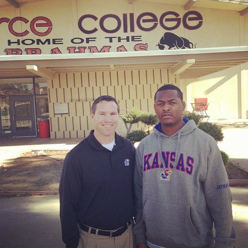 Class of 2013 linebacker Marcus Jenkins-Moore poses with KU linebackers coach Clint Bowen during a recent visit in California. 