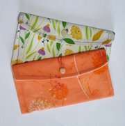 These wallets and other designs by Lawrence illustrator and textile designer Leah Hoelscher will be for sale at the Fresh Squeezed Art Market Feb. 9 in Kansas City, Mo.