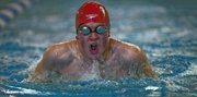 Lawrence High senior Patrick Bennett swims his portion of the 200-yard medley relay at the Last Chance Meet on Thursday, Feb. 7, 2013, at FSHS.