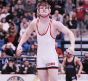 Lawrence High senior Andrew Denning celebrates after securing a spot in the 182-pound championship match at the 6A state wrestling tournament in Wichita on Saturday, Feb. 22, Denning pinned Topeka junior Austin Tillman 32 seconds into their semifinal match.