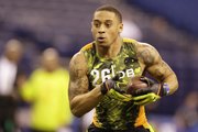 Kansas defensive back Bradley McDougald runs a drill at the NFL football scouting combine in Indianapolis, Tuesday, Feb. 26, 2013.