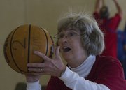 Pastor Shirley Edgerton, of the Vinland United Methodist Church, made 100 free throws Saturday at an event to raise money to fight malaria.