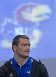 Linebacker Ben Heeney, speaks to reporters during a spring football practice press conference Monday, March, 4, 2013 at KU.