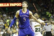 Kansas' Jeff Withey (5) and Baylor's A.J. Walton (22) position for a rebound in KU's 81-58 loss to the Baylor Bears Saturday in Waco, Texas.