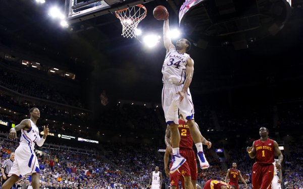 Kansas forward Perry Ellis comes in for a dunk against Iowa State during the first half of the semifinal round of the Big 12 tournament on Friday, March 15, 2013 at the Sprint Center in Kansas City, Missouri.