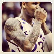 Tattooed on Ben McLemore&squot;s right shoulder read the words "Best of Both." Above the words are hands cradling half a world and half a basketball. McLemore explained the tattoo as a representation of coming from poverty and also his success on the basketball court.