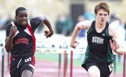 Lawrence High sophomore Dearion Cooper, left, and Free State senior Alex Heath sprint to the finish of the boys 110 meter hurdles on Monday, April 22, 2013 at Free State High School.