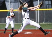 Free State pitcher Meredith Morris goes into her delivery during the third inning against Shawnee Mission West on Thursday, April 25, 2013, at Free State High School.
