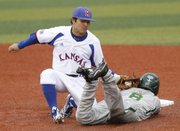 Kansas University infielder Justin Protacio (20) puts the tag on Baylor runner Lawton Langford (8), foiling a steal attempt during in the Jayhawks’ first game of a three-game weekend series against the Bears, Friday, May 3, 2013, at Hoglund Ballpark. KU won, 3-2.
