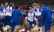 Kansas senior Maggie Hull runs on the field as her name is announced before the start of Kansas' senior day game against Oklahoma Sunday, May 5, 2013, at Arrocha Ballpark.