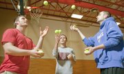 Research by KU sports psychology student Candace Hogue showed that learning a new skill, like juggling, in an ego-driven, non-nurturing environment can elevate physiological stress levels that can be dangerous to health and emotional well-being. Trying their luck juggling from left are freshman Bryce Platt and seniors Kyle Haley and Dustin Befort.