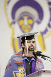 Haskell Indian Nations University student Tyler Levier, the American Indian College Fund Student of the Year at Haskell, addresses his classmates Friday morning during Haskell's 2013 spring commencement in Coffin Sports Complex.