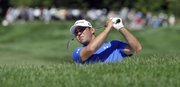 Gary Woodland hits his approach shot on the eighth hole during the fifth annual Notah Begay III Foundation Challenge at Atunyote Golf Club at Turning Stone Resort and Casino in Verona, N.Y., Wednesday, Aug. 29, 2012.