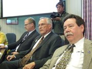 State Board of Education member Ken Willard (center), a Hutchinson Republican, voted against the Next Generation Science Standards, arguing they are not religiously neutral because of the way they treat evolution. Board member John Bacon (left), an Olathe Republican, also voted no. Steve Roberts (right), an Overland Park Republican, voted in favor of the standards, although he had reservations because they were written largely by professors from schools of education.