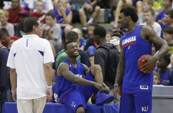 Kansas head coach Bill Self and Naadir Tharpe laugh with newcomer Tarik Black before a scrimmage on Wednesday, June 12, 2013 at the Horejsi Center. 